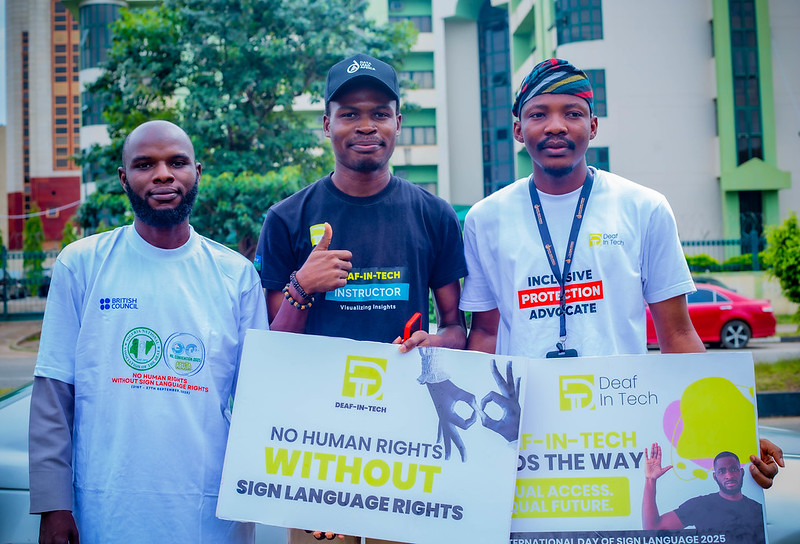 Picture of three people at the Deaf awareness walk
